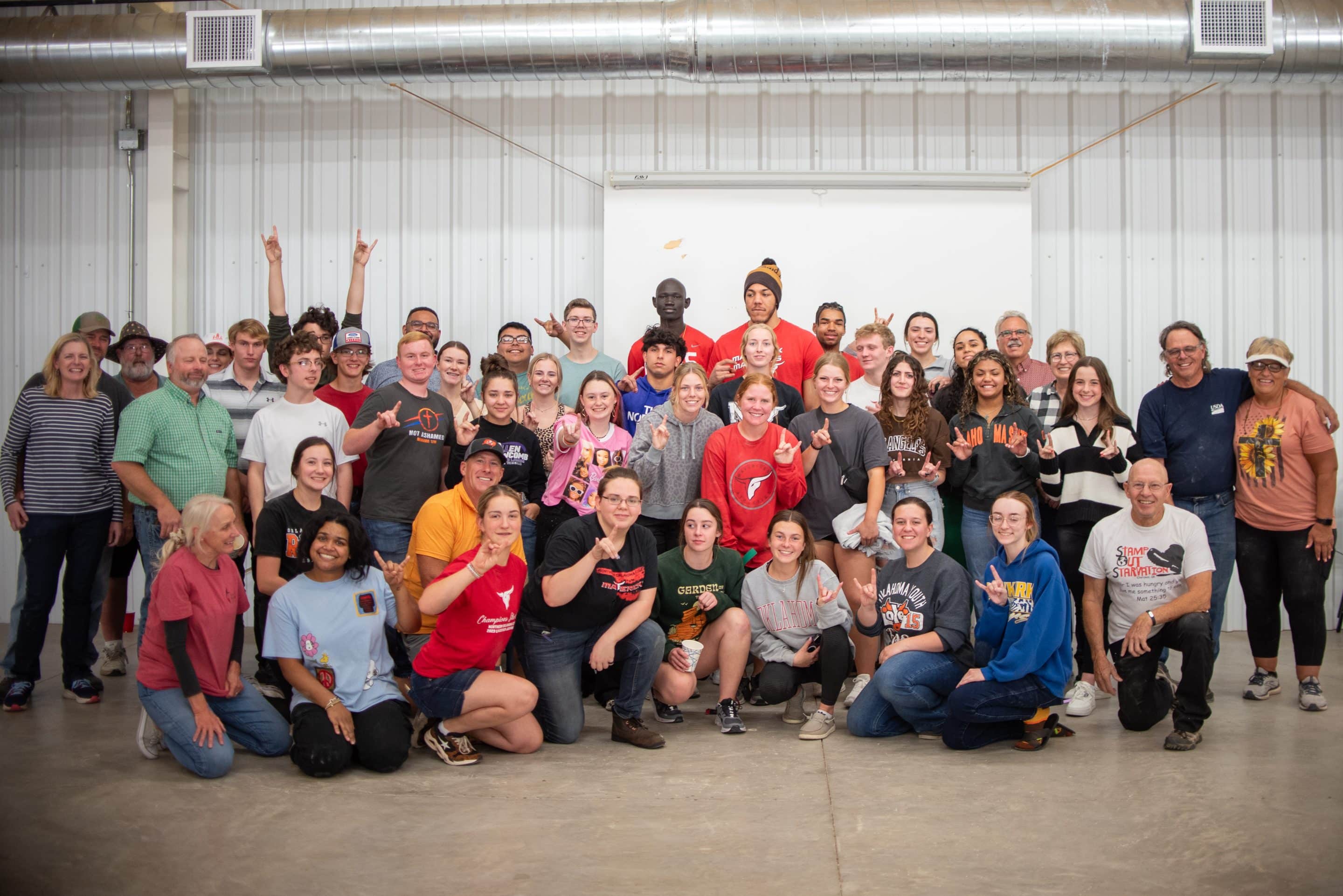 Over 100 volunteers including NOC students participated in a Stamp Out Starvation project at the First United Methodist Church on Sunday. (photo provided)